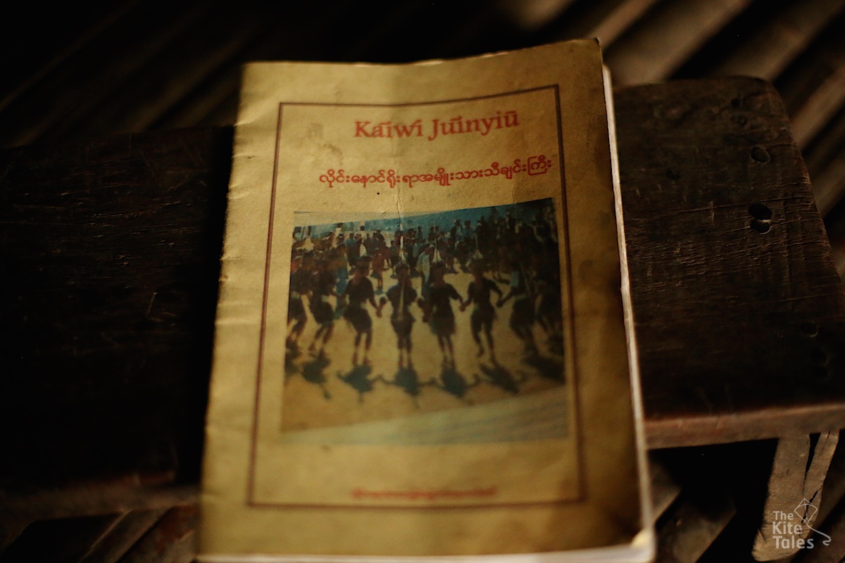A booklet detailing the Kaīvi song, written in bothe English and  Myanmar, was produced in 2011. But the text means little to Ngòm Pok, who  cannot read